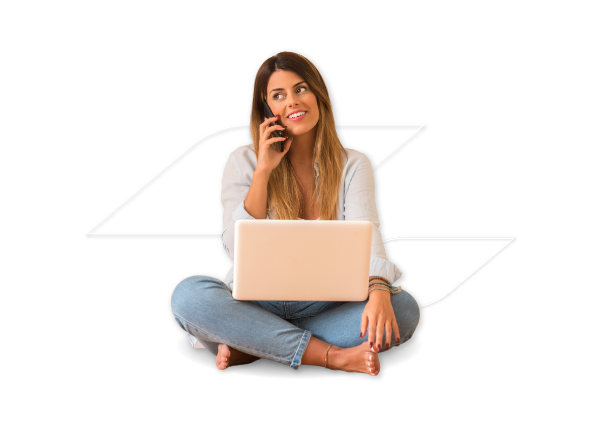 rapariga a falar ao telefone com computador ao colo